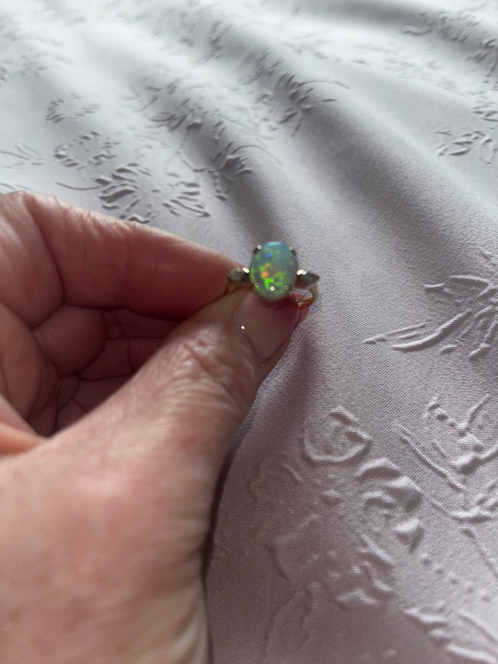 14 Carat Gold Opal & Diamond Ring: Title: 14 Carat Gold Opal & Diamond Ring Description: 14 carat gold opal & diamond ring set with a central oval cabochon Australian opal with a marquise cut diamond to each shoulder. 