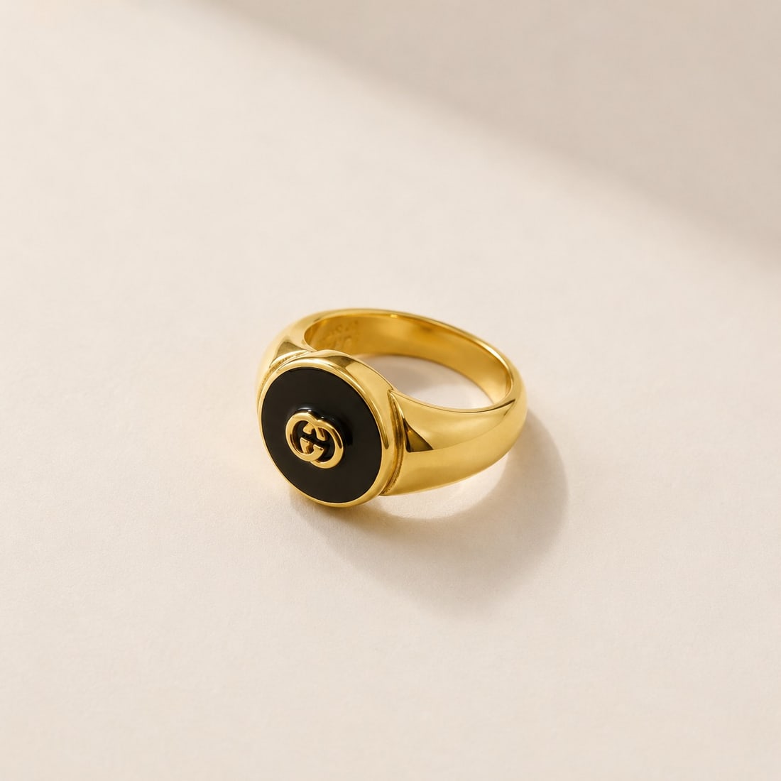Gold-Tone Signet Ring With Black Enamel Accent – Size 17: Title: Gold-Tone Signet Ring With Black Enamel Accent – Size 17 Description: Elegant signet-style ring featuring a polished gold-tone finish and a striking black enamel centrepiece. The