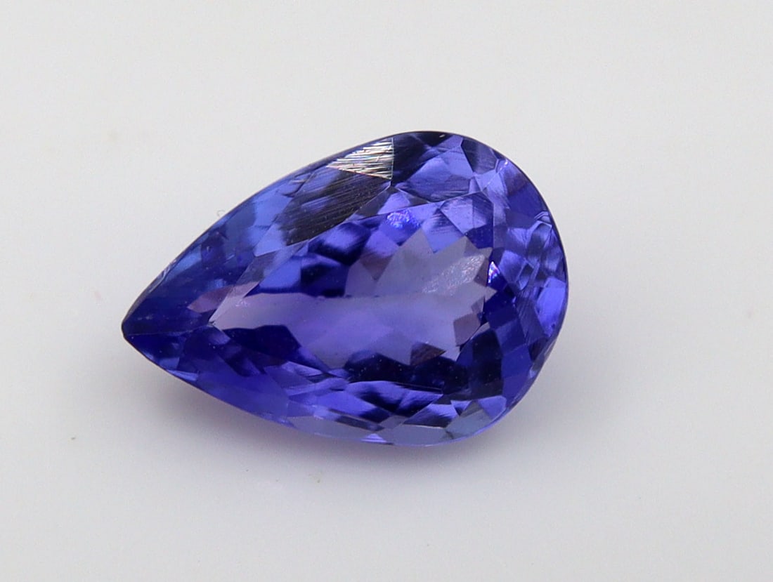 Tanzanite, 1.69 Ct: Title: Tanzanite, 1.69 Ct Description: Species: Zoisite Variety: Tanzanite Shape: Pear Measurements: 9.53x6.65x4.04mm Colour: Bluish Violet Certificate: Yes (IGI/