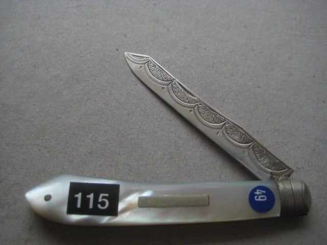George V Mother of Pearl Hafted Silver Bladed Folding Fruit Knife: Title: George V Mother of Pearl Hafted Silver Bladed Folding Fruit Knife Description: George V Mother of Pearl Hafted Silver Bladed Folding Fruit Knife. The handle is plain, and has a