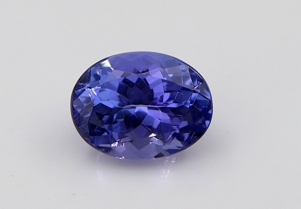 Tanzanite 1.68 Ct: Title: Tanzanite 1.68 Ct Description: Species: Zoisite Variety: Tanzanite Shape: Oval Measurements: 7.95x6.08x4.81mm Colour: Bluish Violet Certificate: Yes (IGI/