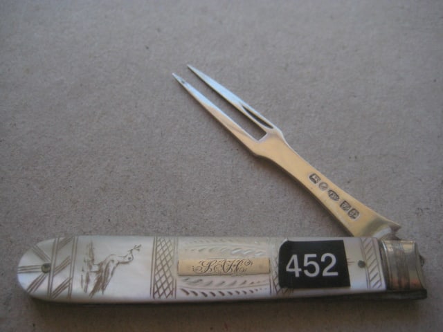 Victorian Mother of Pearl Hafted Silver Bladed Folding Fruit Fork: Title: Victorian Mother of Pearl Hafted Silver Bladed Folding Fruit Fork Description: Victorian Mother of Pearl Hafted Silver Bladed Folding Fruit Fork. The handle is dec