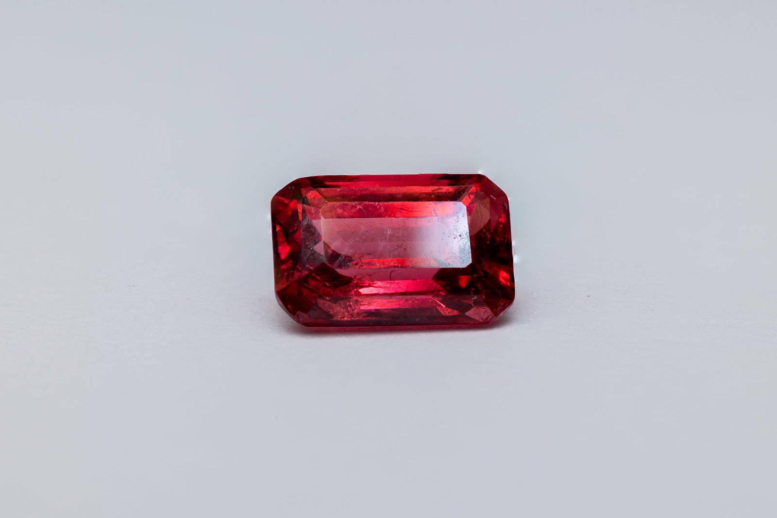 Spinel 1.02 Ct: Title: Spinel 1.02 Ct Description: Species: Natural Spinel Variety: Red Spinel Shape: Emerald Cut Measurements: 4.73x4.52x3.47mm Colour: Red Comment: Untreated 