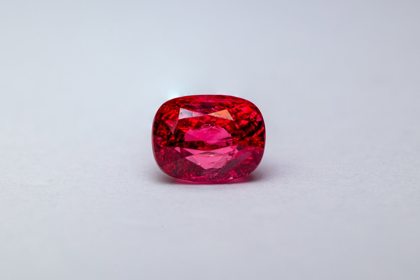 Spinel 1.04 Ct: Title: Spinel 1.04 Ct Description: Species: Natural Spinel Variety: Red Spinel Shape: Rectangular Cushion Measurements: 6.11x4.67x4.44mm Colour: Pinkish Red Comment:
