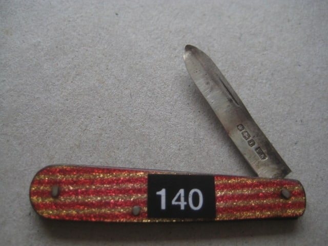 Rare George V Bakerlite Plastic Hafted Silver Bladed Folding Fruit Knife: Title: Rare George V Bakerlite Plastic Hafted Silver Bladed Folding Fruit Knife Description: Rare George V Red and Gold Striped Bakerlite Plastic Hafted Silver Bladed Folding Fruit Knife.
