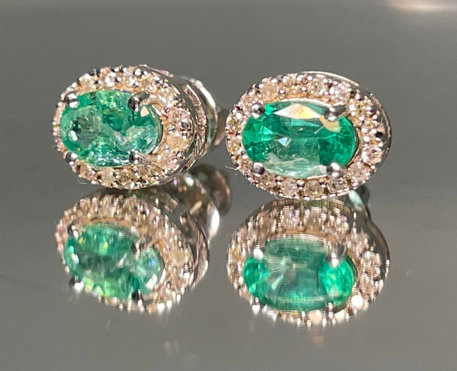 Beautiful Natural Emerald Halo Set Stud Earrings 18k White Gold: Title: Beautiful Natural Emerald Halo Set Stud Earrings 18k White Gold Description: Beautiful Natural Emerald Halo Set Stud Earrings 18k White Gold. Very Beautiful Earrings will make someone