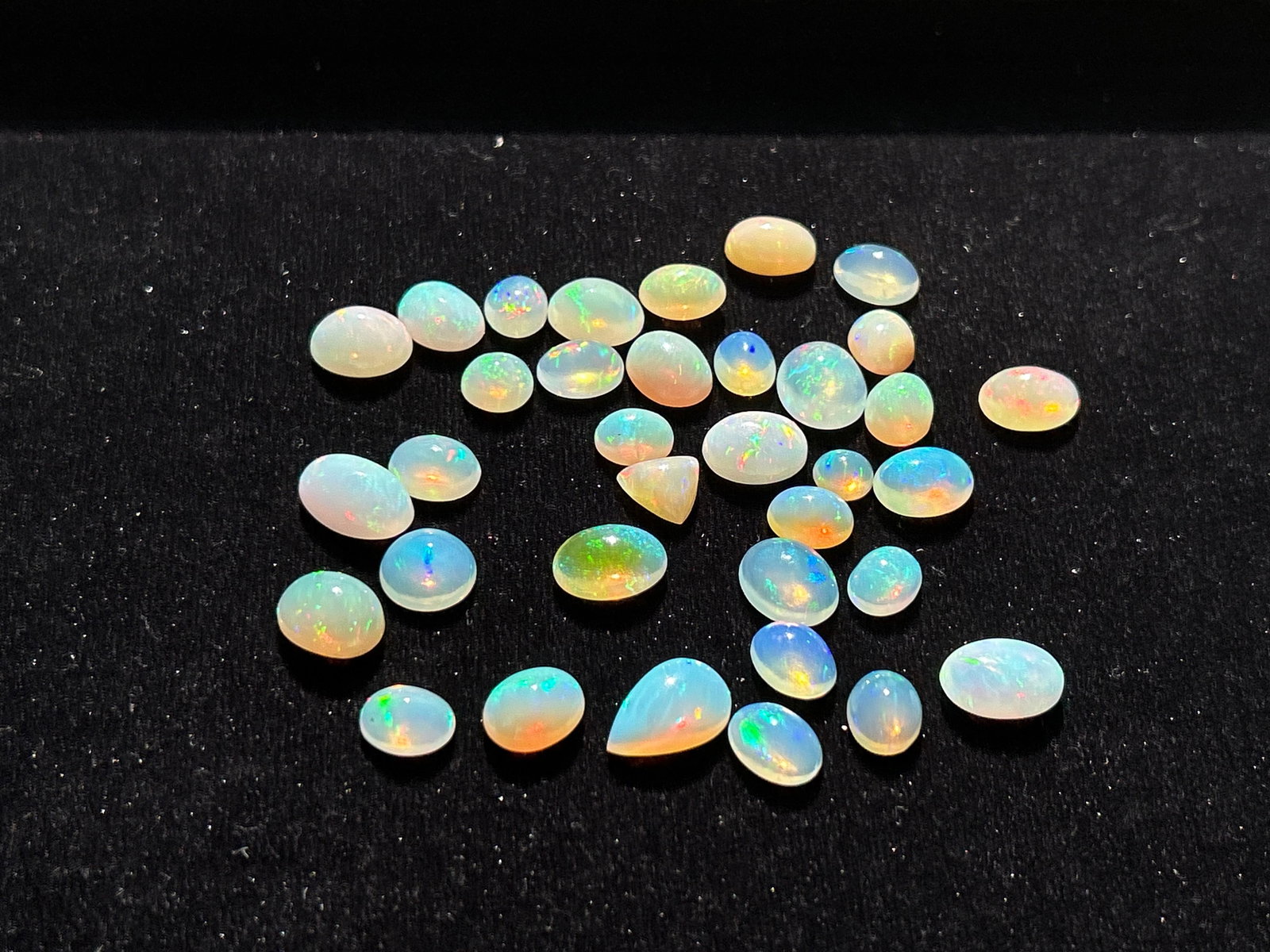 73.90ct Natural Fire Opal: Title: 73.90ct Natural Fire Opal Description: 73.90ct Natural Fire Opal Ideal for rings, earrings, necklaces and bracelets Please note pictures taken in natural sunlight