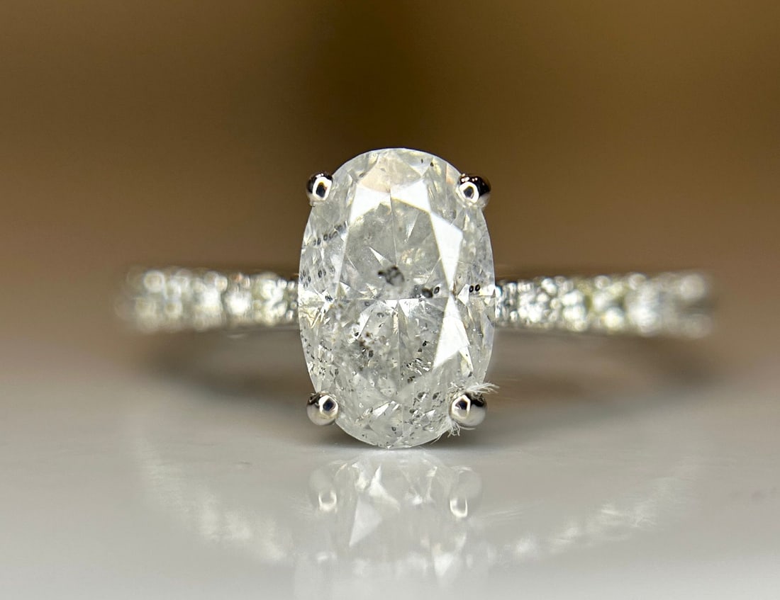 Beautiful Natural 1.69 CT Diamond Ring With 18k Gold: Title: Beautiful Natural 1.69 CT Diamond Ring With 18k Gold Description: Beautiful Natural 1.69CT Diamond Ring With 18k Gold. Description: Total Carat Weight - 1.69ct C