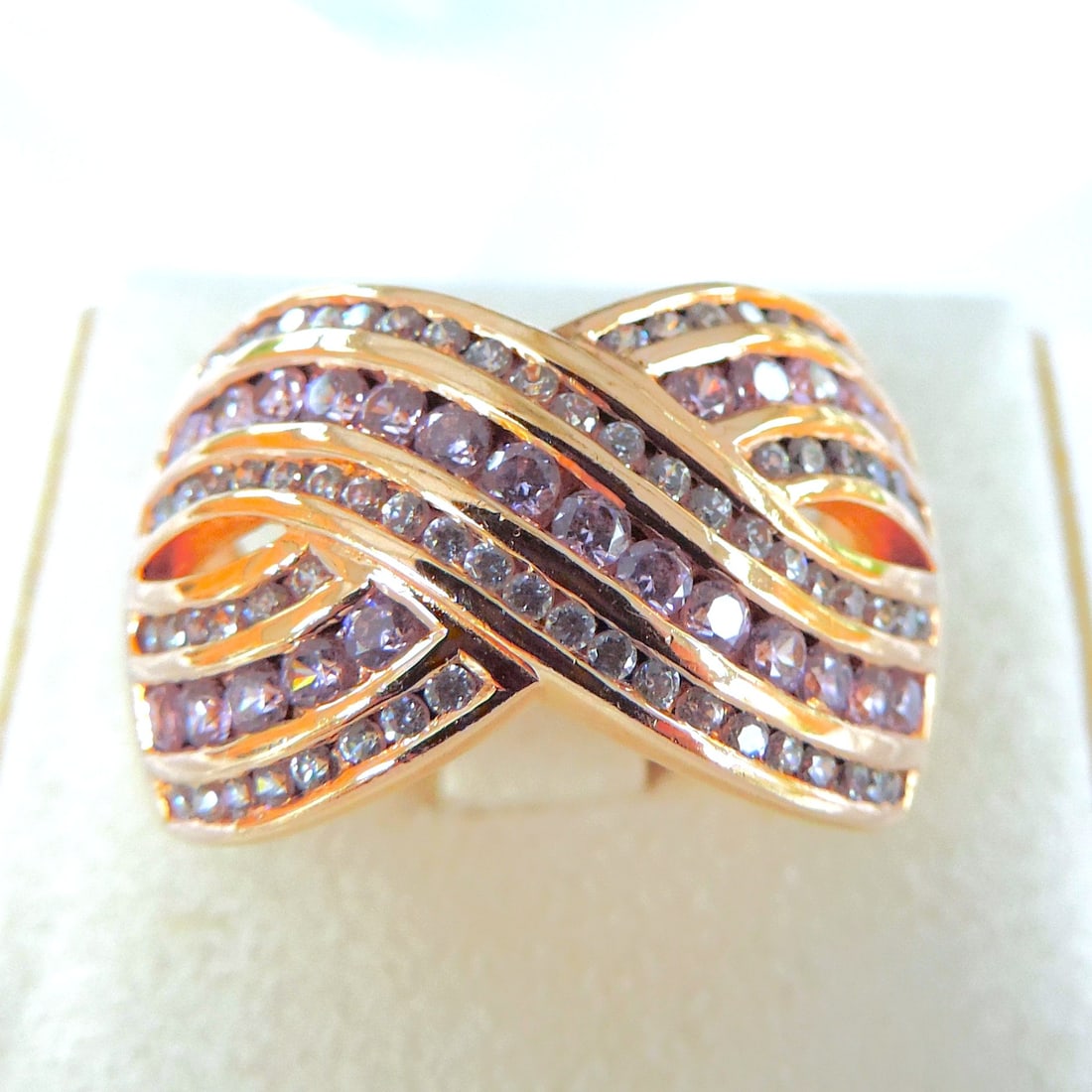 18k Gold On 925 Silver Pink & White CZ Gemstone Ring 'New': Title: 18k Gold On 925 Silver Pink & White CZ Gemstone Ring 'New' Description: A gorgeous crossover ring in sterling silver with a 18k gold overlay set with sparkling pink & white CZ