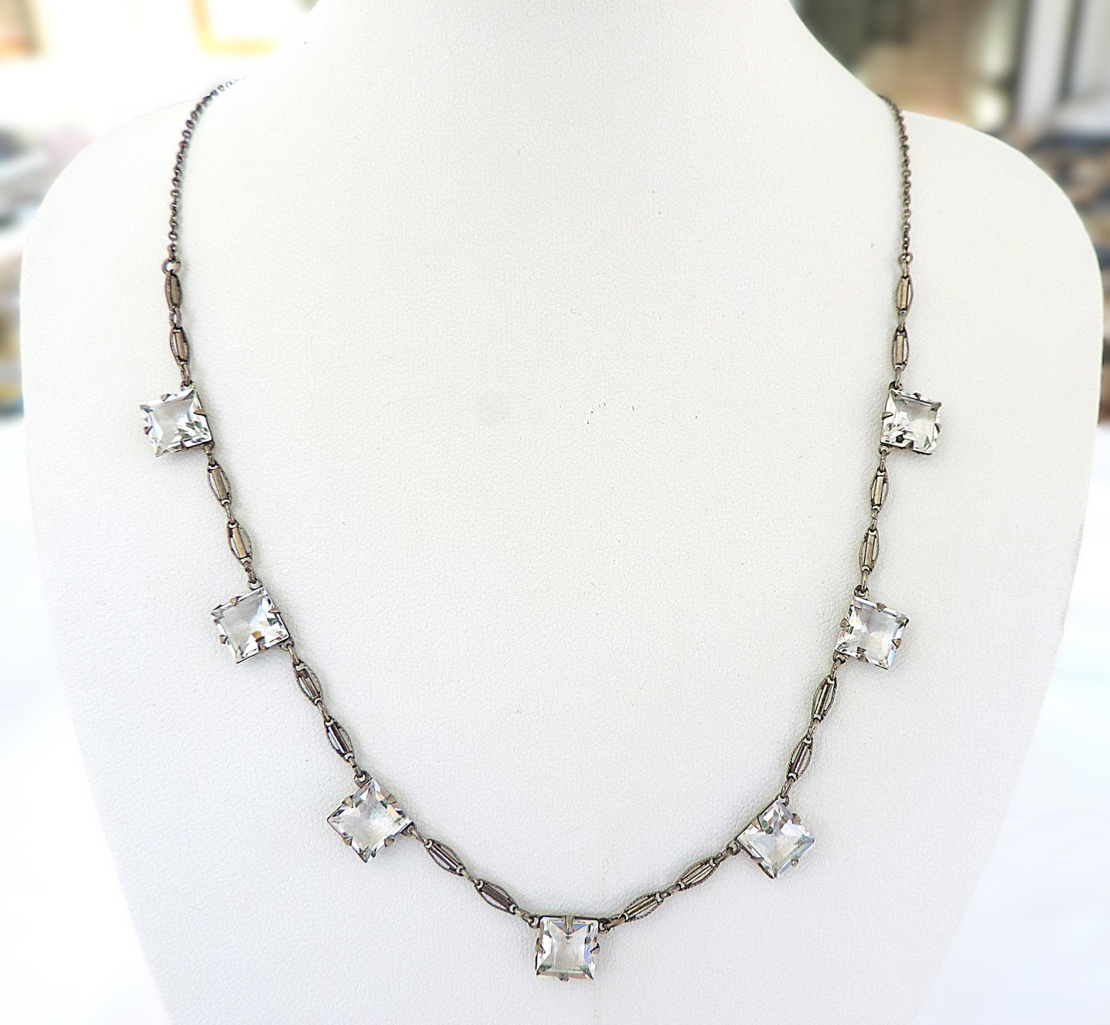 Vintage Art Deco Crystal Necklace Circa 1930's: Title: Vintage Art Deco Crystal Necklace Circa 1930's Description: A gorgeous vintage necklace set with square crystals. Measures: 17 inches long. Condition: Used Delivery option: Collection