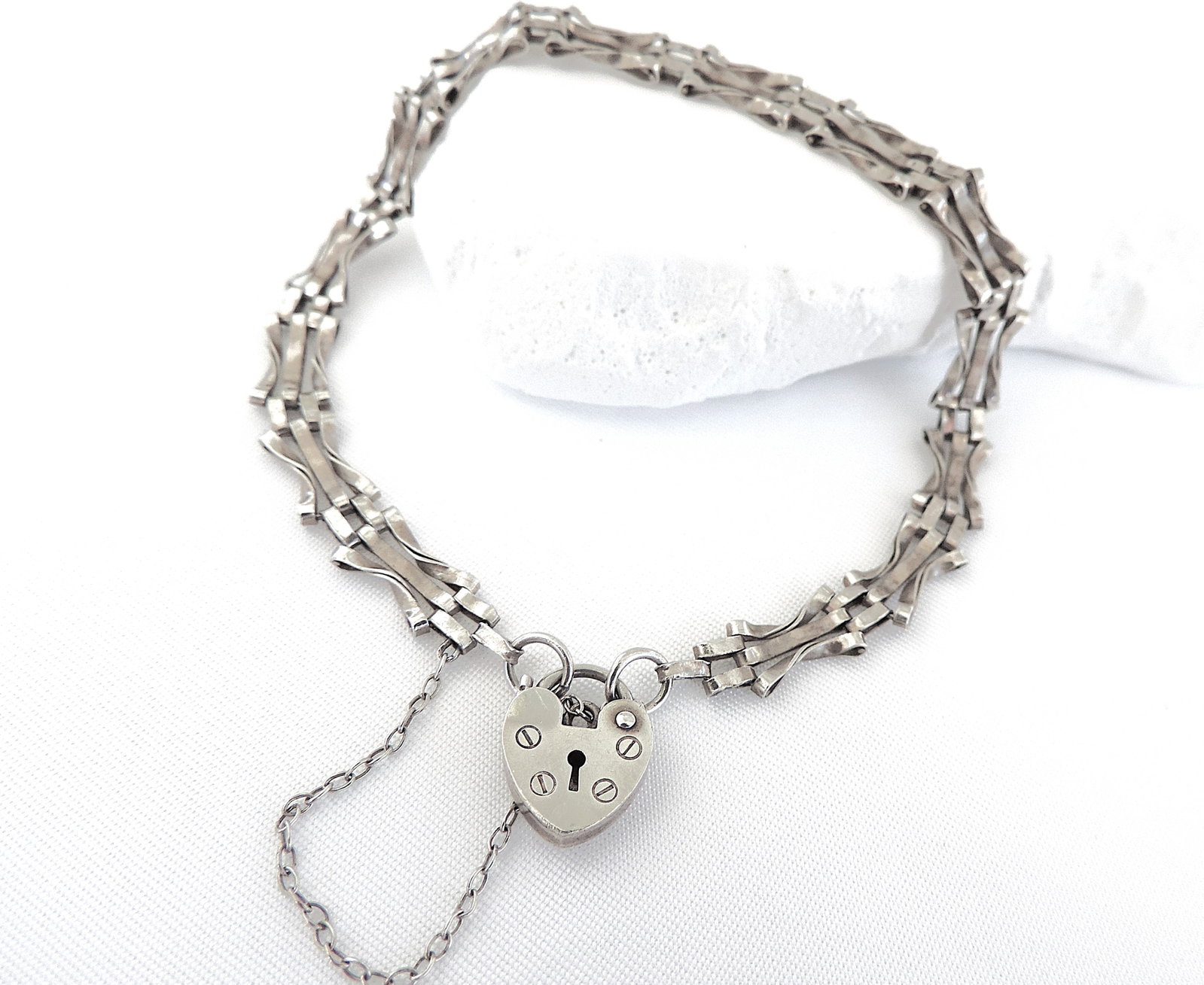 Vintage Sterling Silver Heart Padlock Gate Bracelet: Title: Vintage Sterling Silver Heart Padlock Gate Bracelet Description: A lovely 3 bar sterling silver gate bracelet with heart padlock and safety chain. Stamped silver on heart. 