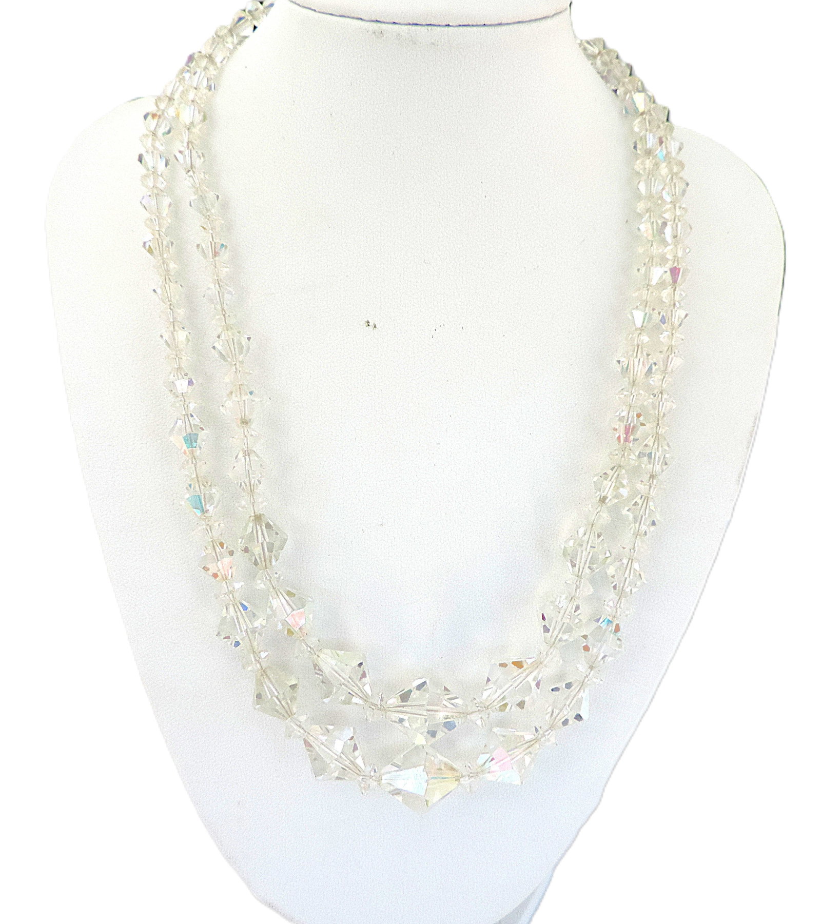 Vintage Double Strand Aurora Borealis Necklace: Title: Vintage Double Strand Aurora Borealis Necklace Description: A lovely vintage double strand Aurora Borealis Crystal necklace measuring 15 inches in length. Condition: Used Delivery option: