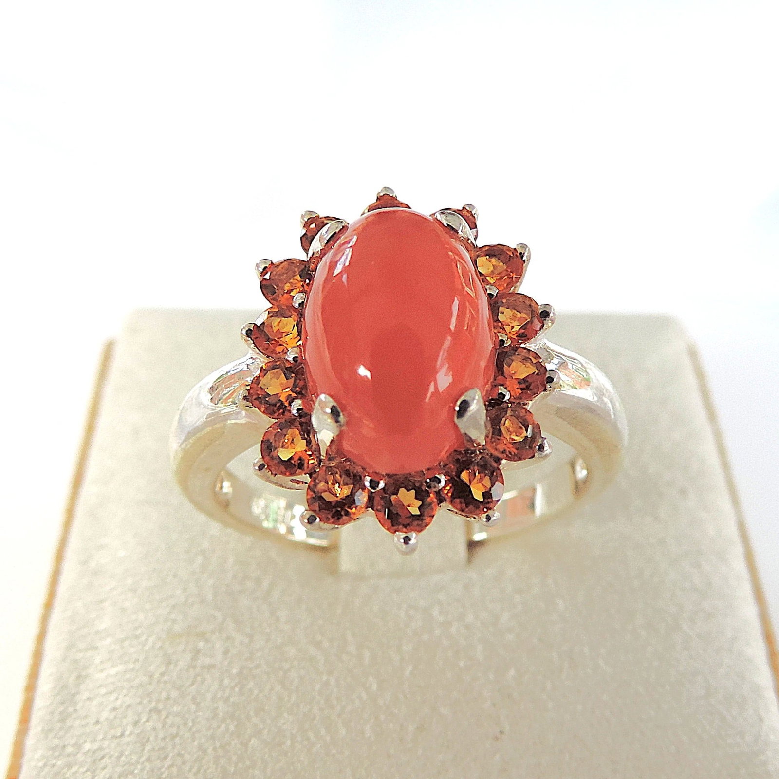 Sterling Silver 5 Carat Cabochon Spessartite Gemstone Ring 'New With Gift Box': Title: Sterling Silver 5 Carat Cabochon Spessartite Gemstone Ring 'New With Gift Box' Description: A stunning ring in sterling silver set with a 12x10mm (TCW 5.0) Orange Spessartite Cabochon