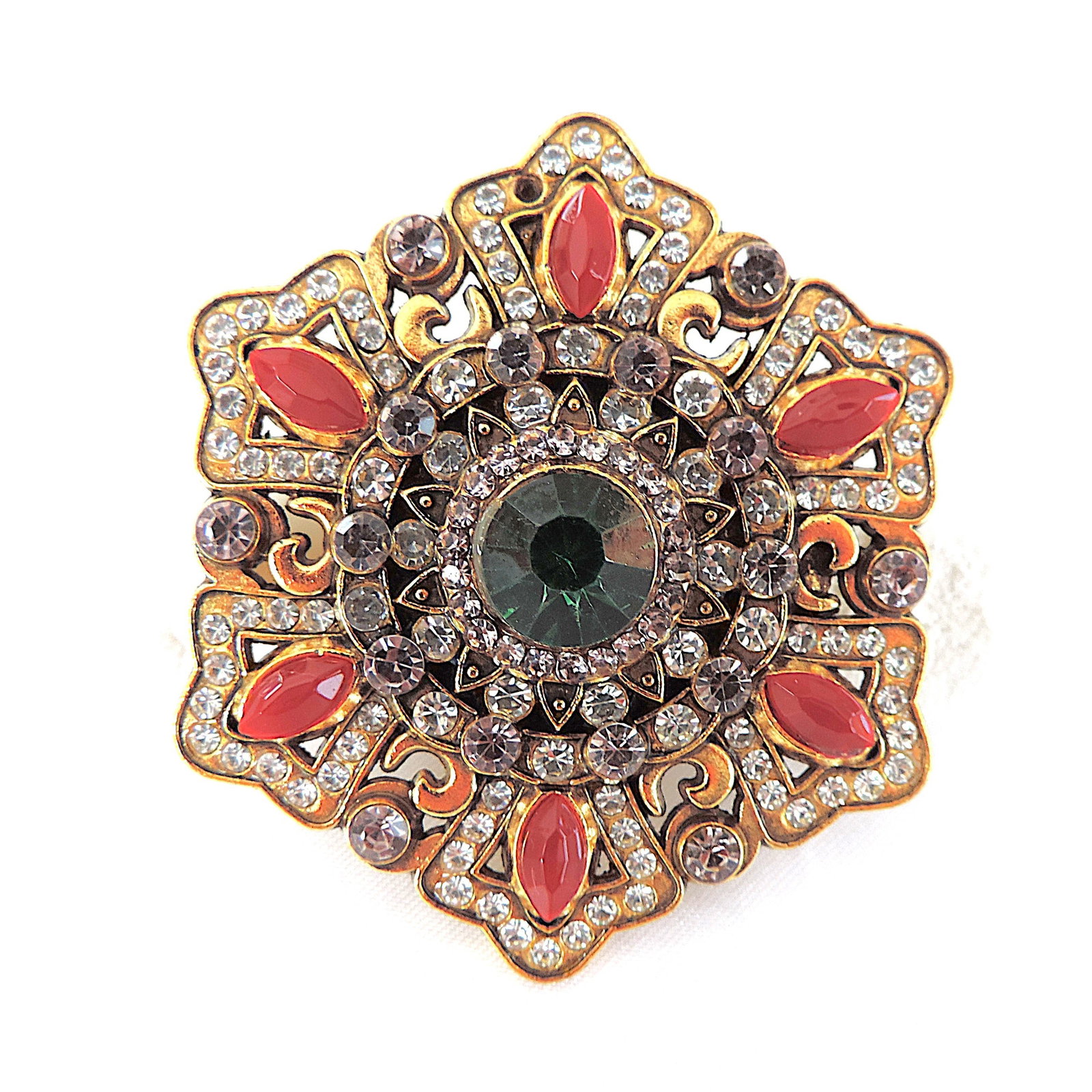 Baroque Style Crystal Brooch: Title: Baroque Style Crystal Brooch Description: A lovely gold tone metal brooch in the Baroque style set with multi-coloured crystals. The brooch is in excellent condition. Condition:
