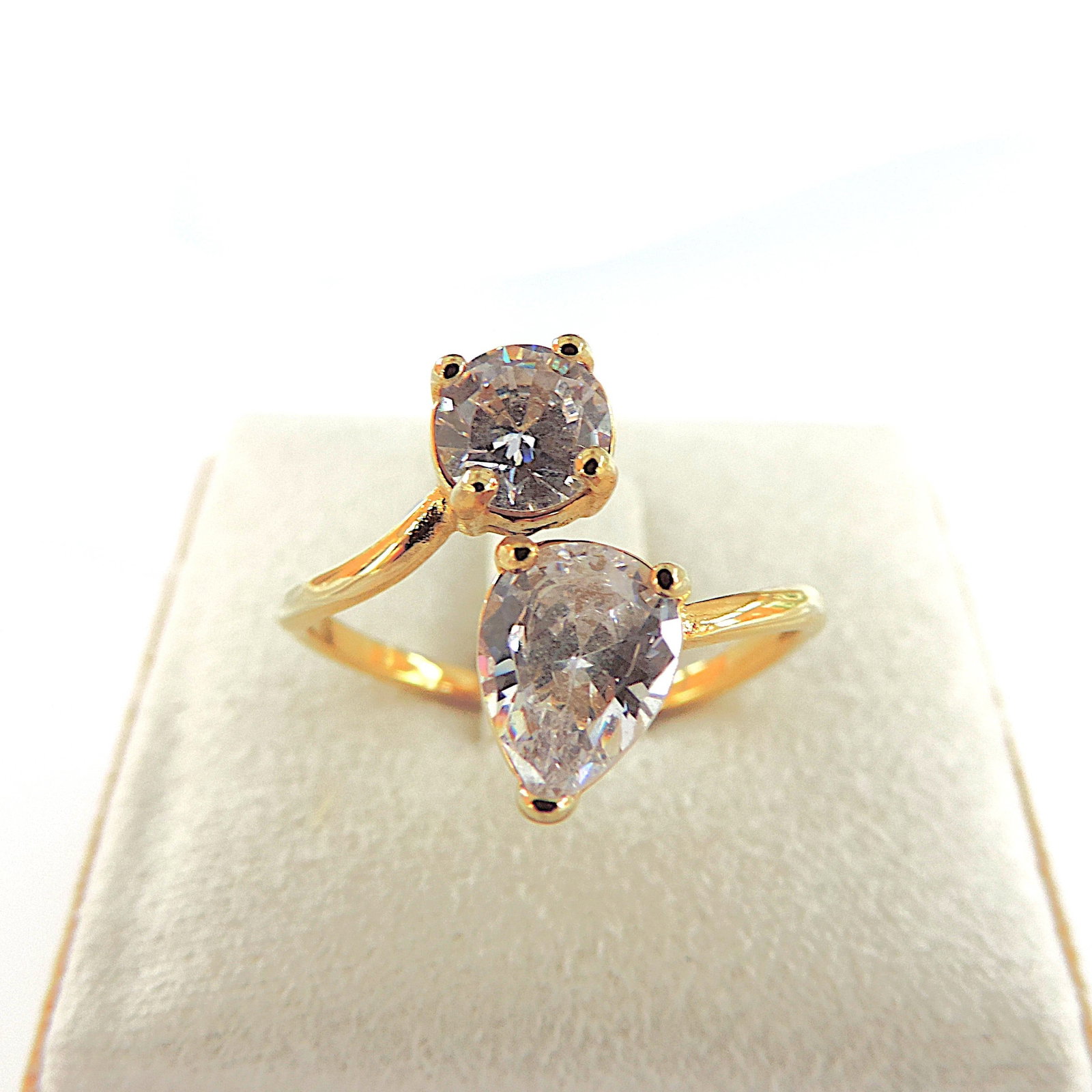 14k Gold On Silver CZ Gemstone Ring: Title: 14k Gold On Silver CZ Gemstone Ring Description: A lovely ring 14k gold on silver set with CZ gemstones. Ring size O Condition: New Delivery option: Collection & Delivery Location: