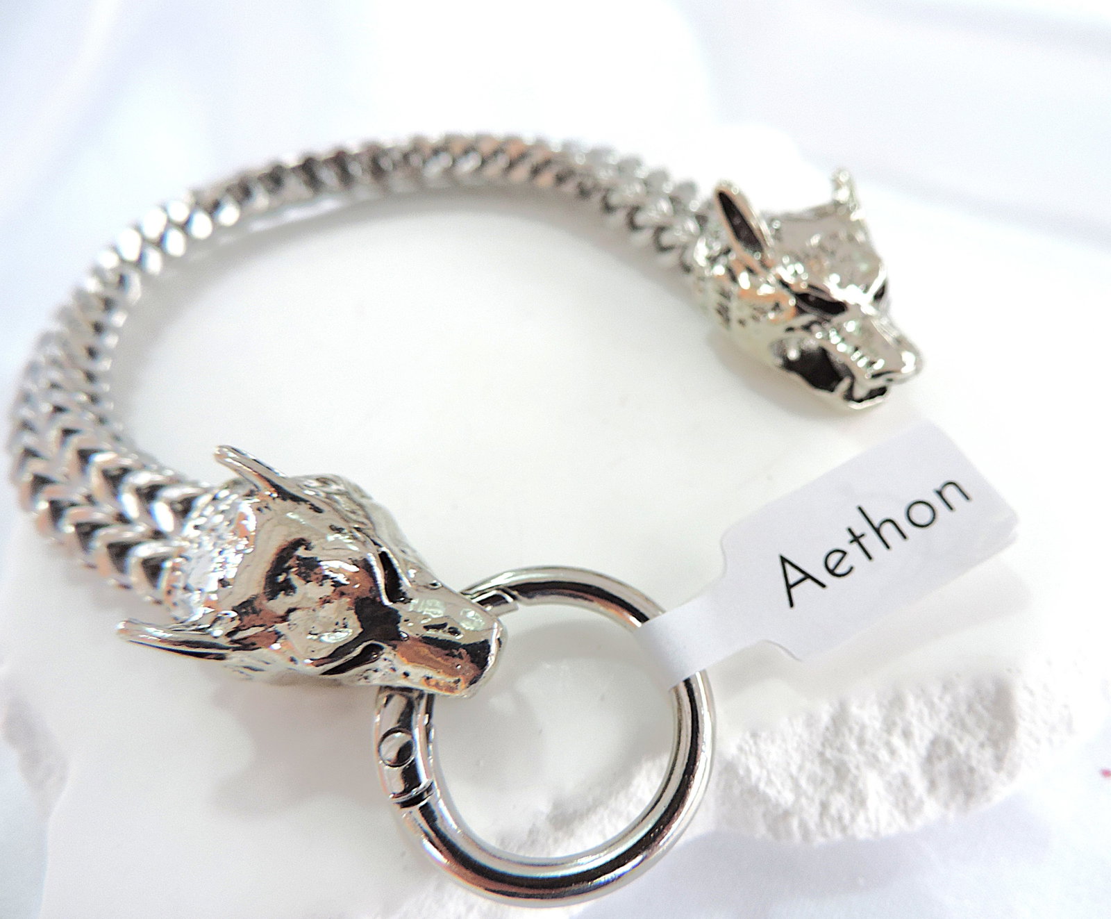Men's Aethon Nordic Viking Style Wolf Head Stainless Steel Bracelet: Title: Men's Aethon Nordic Viking Style Wolf Head Stainless Steel Bracelet Description: Men's stainless steel Nordic Viking style bracelet by Aethon. Measurements: 8.5 inches long. (Part of