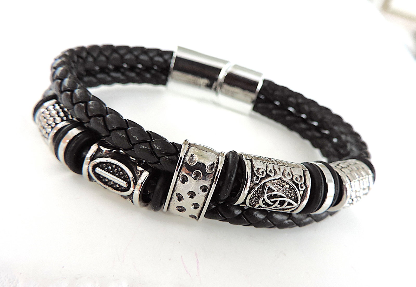 Aethon Black Leather Celtic Knot Bracelet 'New': Title: Aethon Black Leather Celtic Knot Bracelet 'New' Description: Aethon Jewellery stylish men's Celtic knot leather bracelet 8.25 inches long. (Part of liquidation stock of a high end designer