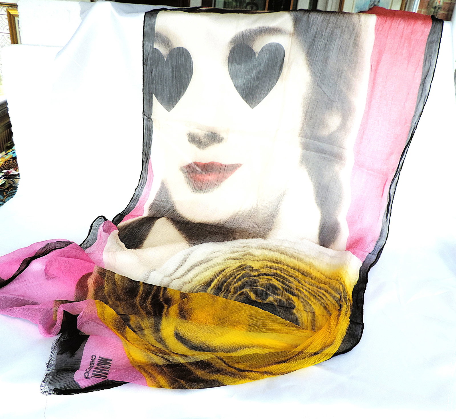 Moschino Silk Chiffon Scarf 172x60cm: Title: Moschino Silk Chiffon Scarf 172x60cm Description: A rare MOSCHINO 100% silk chiffon print scarf measuring 172cm long x 60cm wide. Made in Italy the scarf has hand rolled and stitched