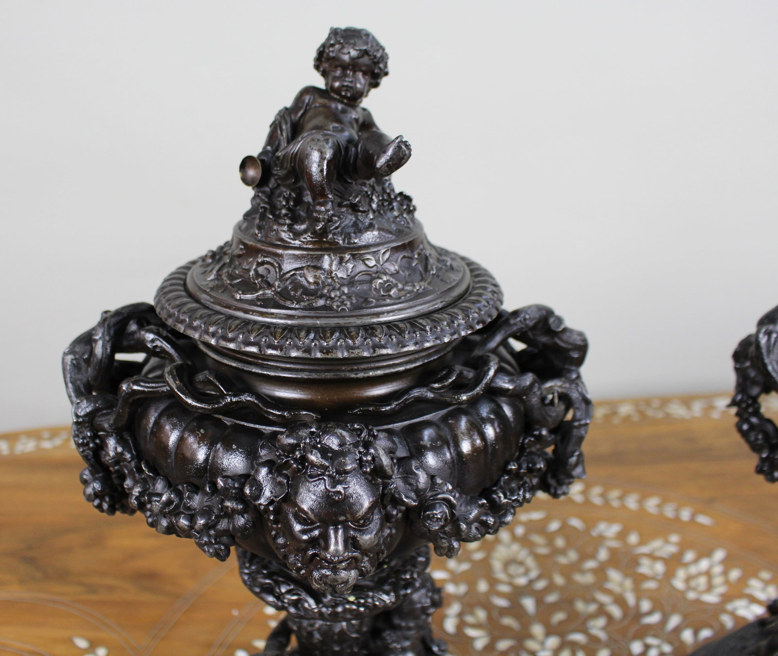 Pair of French Bronzed Spelter Urns with Bacchic Masks and Putti, Circa 1880 - 4
