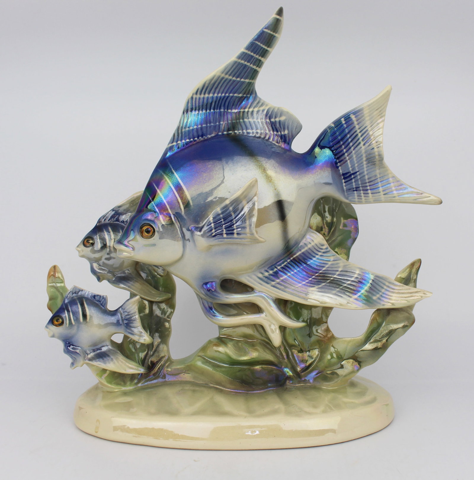 Vintage Jema Holland Fish Sculpture: Title: Vintage Jema Holland Fish Sculpture Description: Vintage Jema Holland Fish Sculpture. Measures 25 x 11 x 26 (height) cm. Several chips to the fish and seaweed including broken fin to smaller
