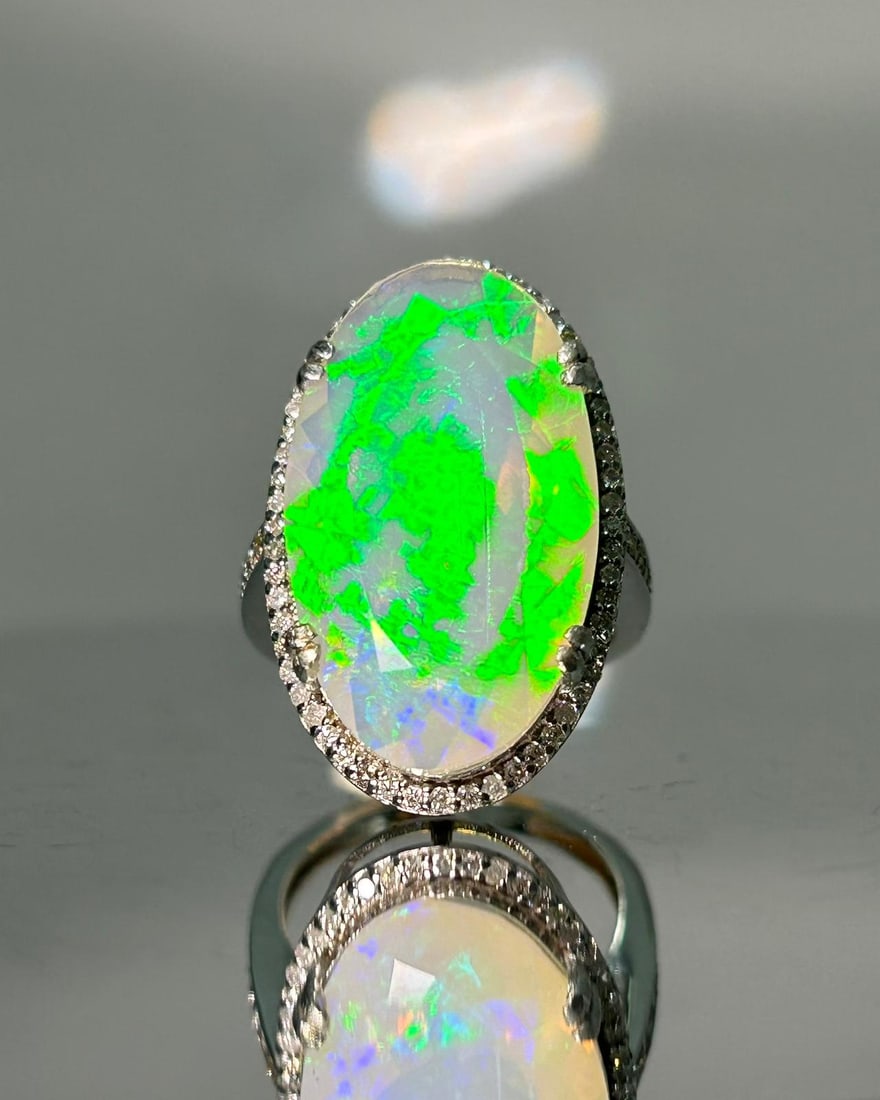 Beautiful Faceted 7.74 CT Natural Opal Ring With Natural Diamond & 18k Gold: Title: Beautiful Faceted 7.74 CT Natural Opal Ring With Natural Diamond & 18k Gold Description: Beautiful 7.74 CT Natural Black Opal Ring With Natural Black Diamond and 18k Gold. 7.74