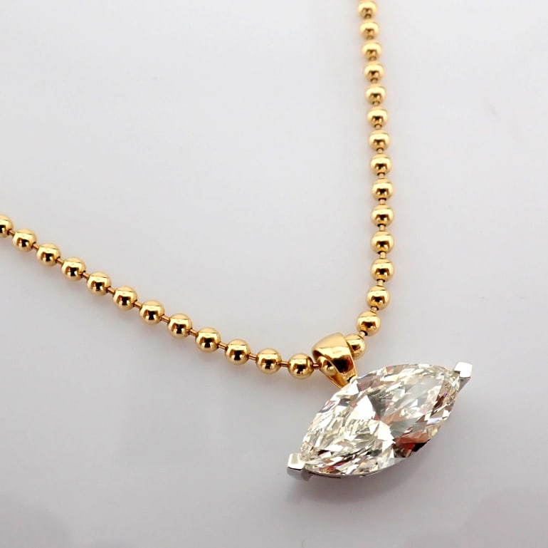 Marquise Cut Lab-Grown Diamond Necklace - 3.91 Total Carat (IGI Certified): Title: Marquise Cut Lab-Grown Diamond Necklace - 3.91 Total Carat (IGI Certified) Description: -------------------------------------------------- METALS AND WEIGHTS : -14K Yellow/White Gold 14.88 gr