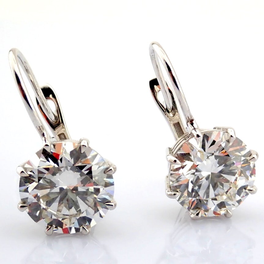 Round Cut Lab-Grown Diamond Earring - 6.93 Total Carat (IGI Certified): Title: Round Cut Lab-Grown Diamond Earring - 6.93 Total Carat (IGI Certified) Description: -------------------------------------------------- METALS AND WEIGHTS : -14K White Gold 4