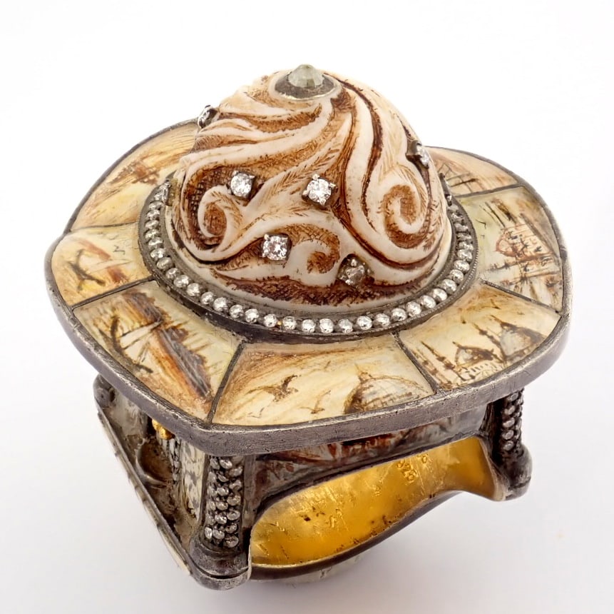 Natural Diamond 24K Yellow Gold Ring: Title: Natural Diamond 24K Yellow Gold Ring Description: An exquisite gold/silver ring intricately detailed with a bone - carved centre .surrounded by micro art and brilliant diamonds - Hand Made