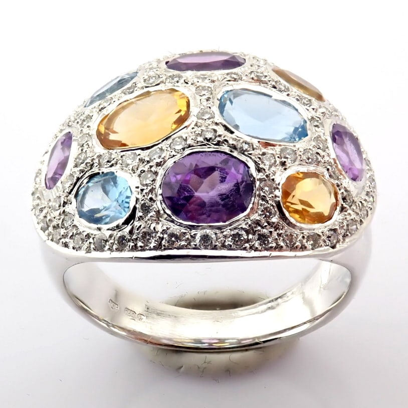 Natural Diamond 18K White Gold Ring: Title: Natural Diamond 18K White Gold Ring Description: 18K white gold ring detailed with semi precious stones and brilliant diamonds -------------------------------------------------- &