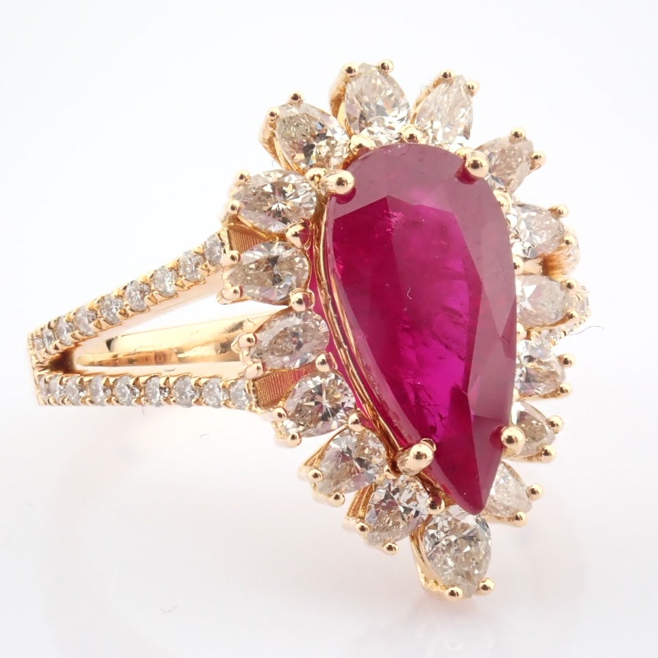 Natural Diamond 18K Rose/Pink Gold Ring: Title: Natural Diamond 18K Rose/Pink Gold Ring Description: 18K rose gold cluster ring detailed with Ruby and brilliant diamonds -------------------------------------------------- •