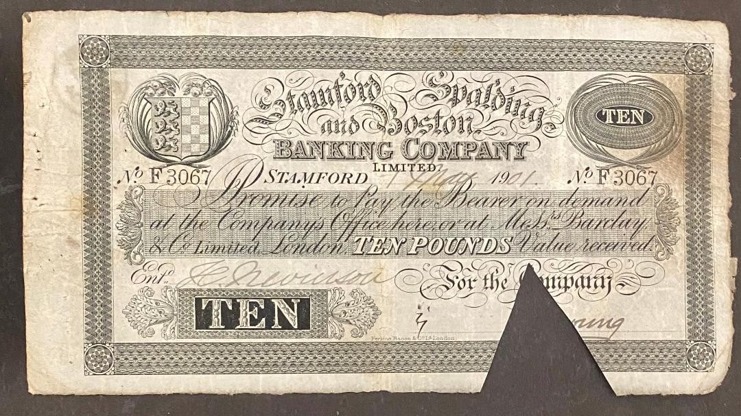1901 BANKNOTE OF £10 STAMFORD, SPALDING & BOSTON BANKNIG COMPANY LTD: Title: 1901 BANKNOTE OF £10 STAMFORD, SPALDING & BOSTON BANKNIG COMPANY LTD Description: DATED 1901 THIS IS A CUT/CANCELLED BANKNOTE FOR THE SUM OF £10 TEN POUNDS ISSUED BY THE