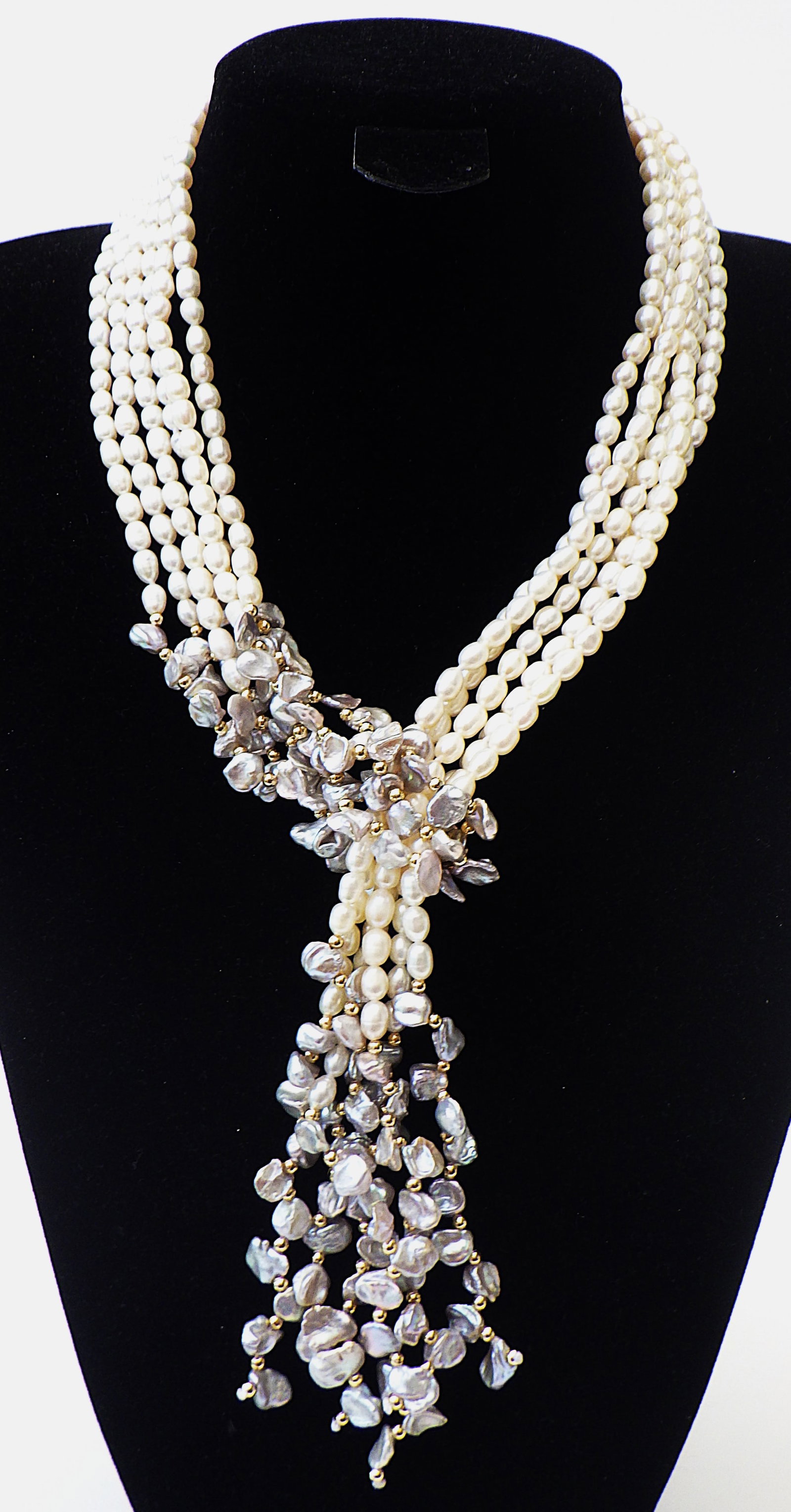 Rare 3 long strand necklace with natural white & grey Keshi pearls: Title: Rare 3 long strand necklace with natural white & grey Keshi pearls Description: A vey unusual and highly fashionable lariat* necklace consisting of three very long (125 cm) strands of