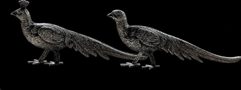 Pair of Ornate Silver Peacock Figurines - Vintage Style Bird Ornaments: Title: Pair of Ornate Silver Peacock Figurines - Vintage Style Bird Ornaments Description: Beautifully detailed pair of silver-toned peacocks, both in elegant standing poses. These are finely cast