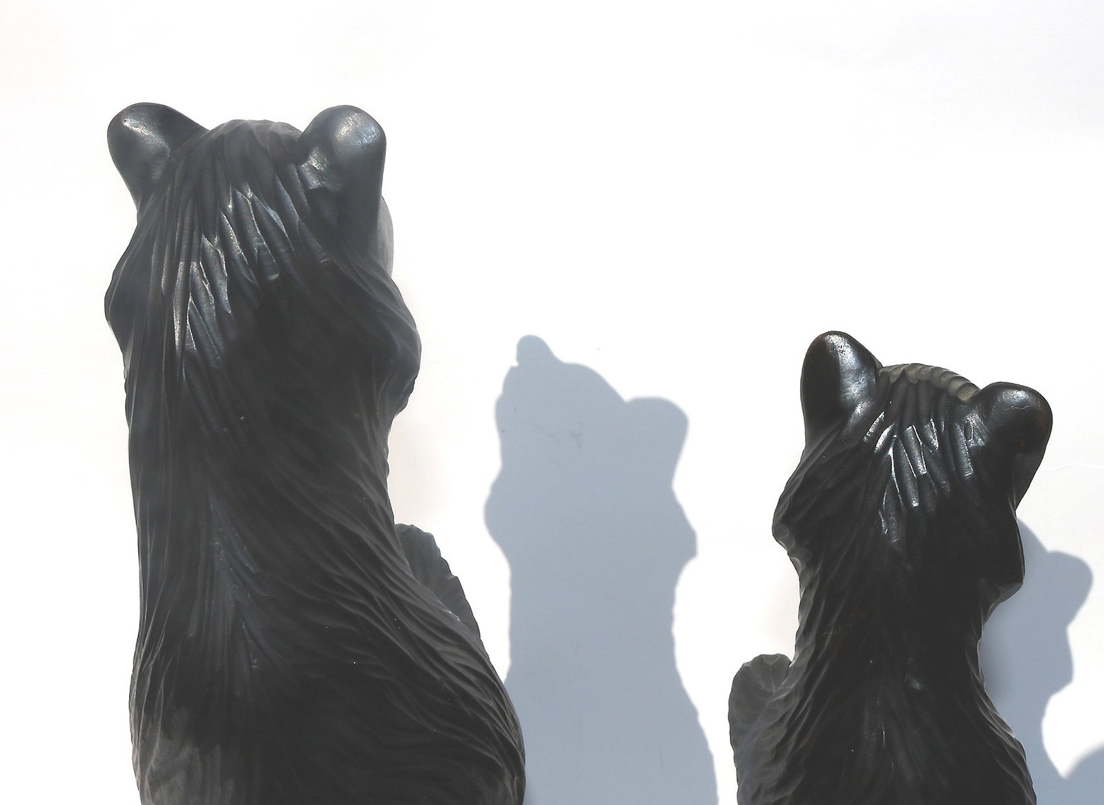 A large pair of good antique Treen Black Forest Begging Bears with glass eyes 19th - 10