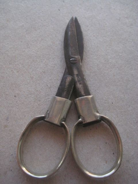 Vintage Folding White Metal Cased Pair of Folding Scissors: Title: Vintage Folding White Metal Cased Pair of Folding Scissors Description: Vintage Folding White Metal Cased Pair of Folding Scissors. Length open is 3.25 Inches. 