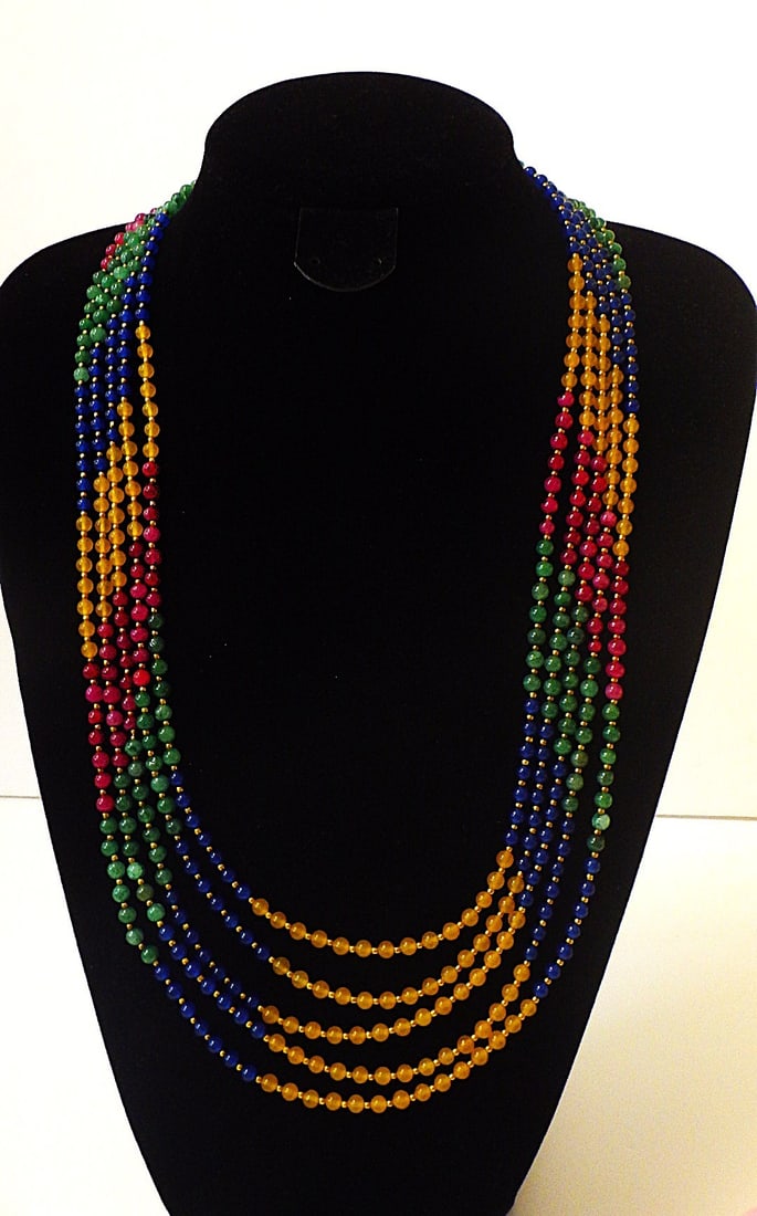 Art deco five strand multi-gem necklace: Title: Art deco five strand multi-gem necklace Description: An exquisite ART DECO five strand multi-gem strand necklace with gold plated parts. Length: 57-71 cm, weight: 84 g. FREE DELIVERY IS