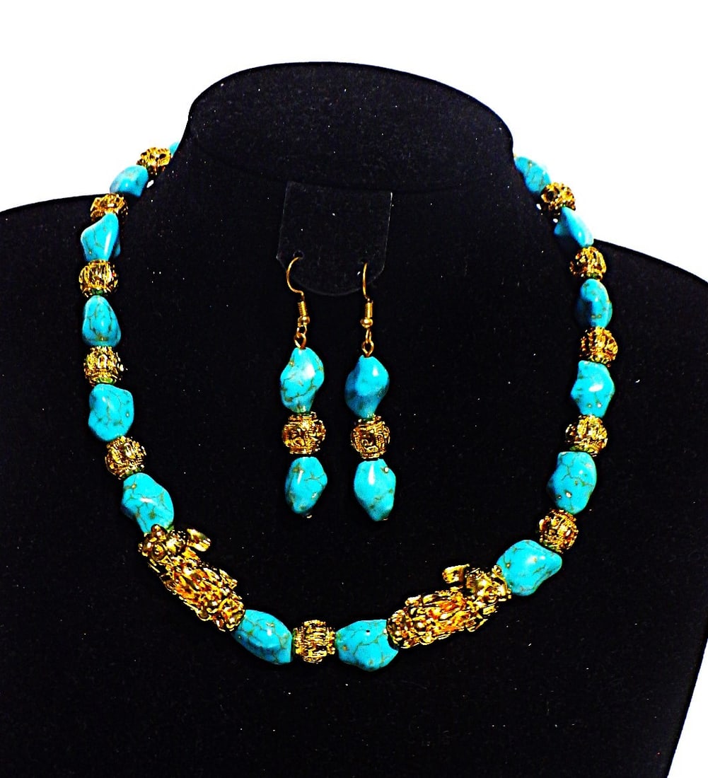 Chinese GP "pixius" & turquoise nuggets jewellery set: Title: Chinese GP "pixius" & turquoise nuggets jewellery set Description: A fabulous, Chinese, turquoise coloured necklace and earrings set with gold plated “pixius” and “good