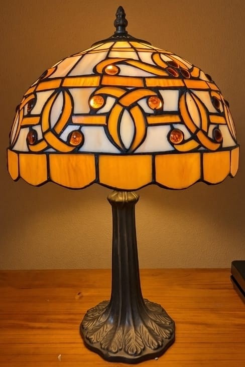 Vintage Tiffany Lamp: Title: Vintage Tiffany Lamp Description: Vintage Tiffany style lamp Add a warm, classic glow to any room with this beautiful vintage Tiffany-style stained glass table la