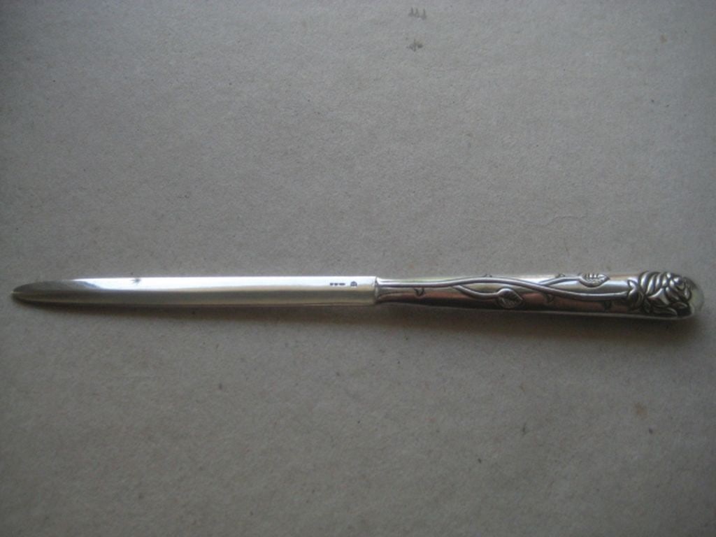 Vintage Silver Letter Opener: Title: Vintage Silver Letter Opener Description: Vintage Silver Letter Opener. Hallmarked for London 1978, and made by Ari D. Norman. Length in Inches is 7.25, and Weight is