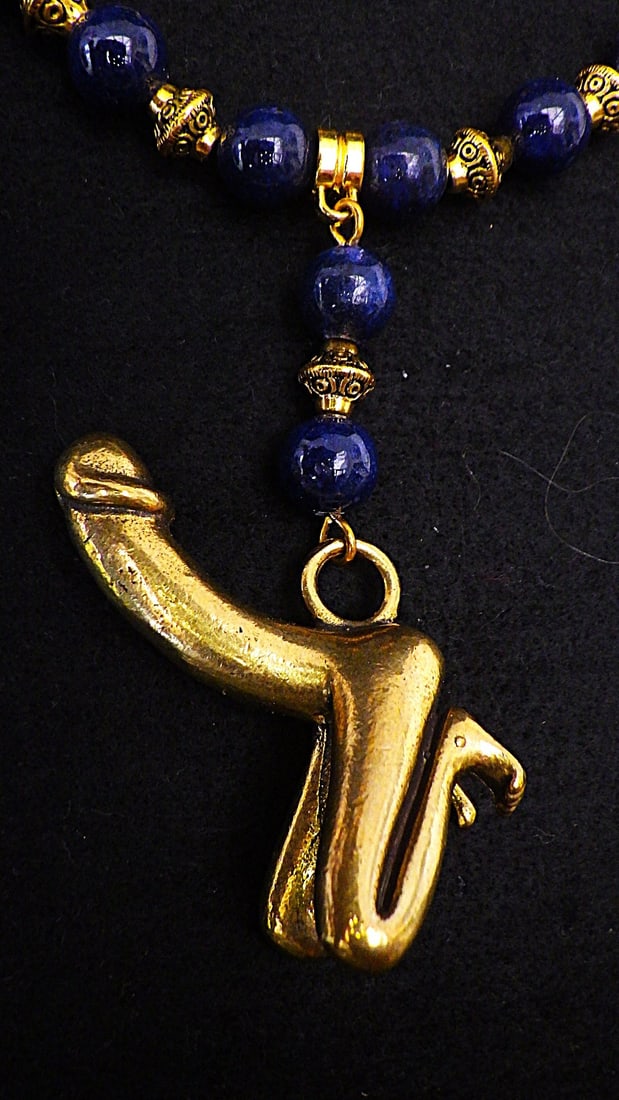 A vintage lapis lazuli necklace with bronze fertility symbol - 2