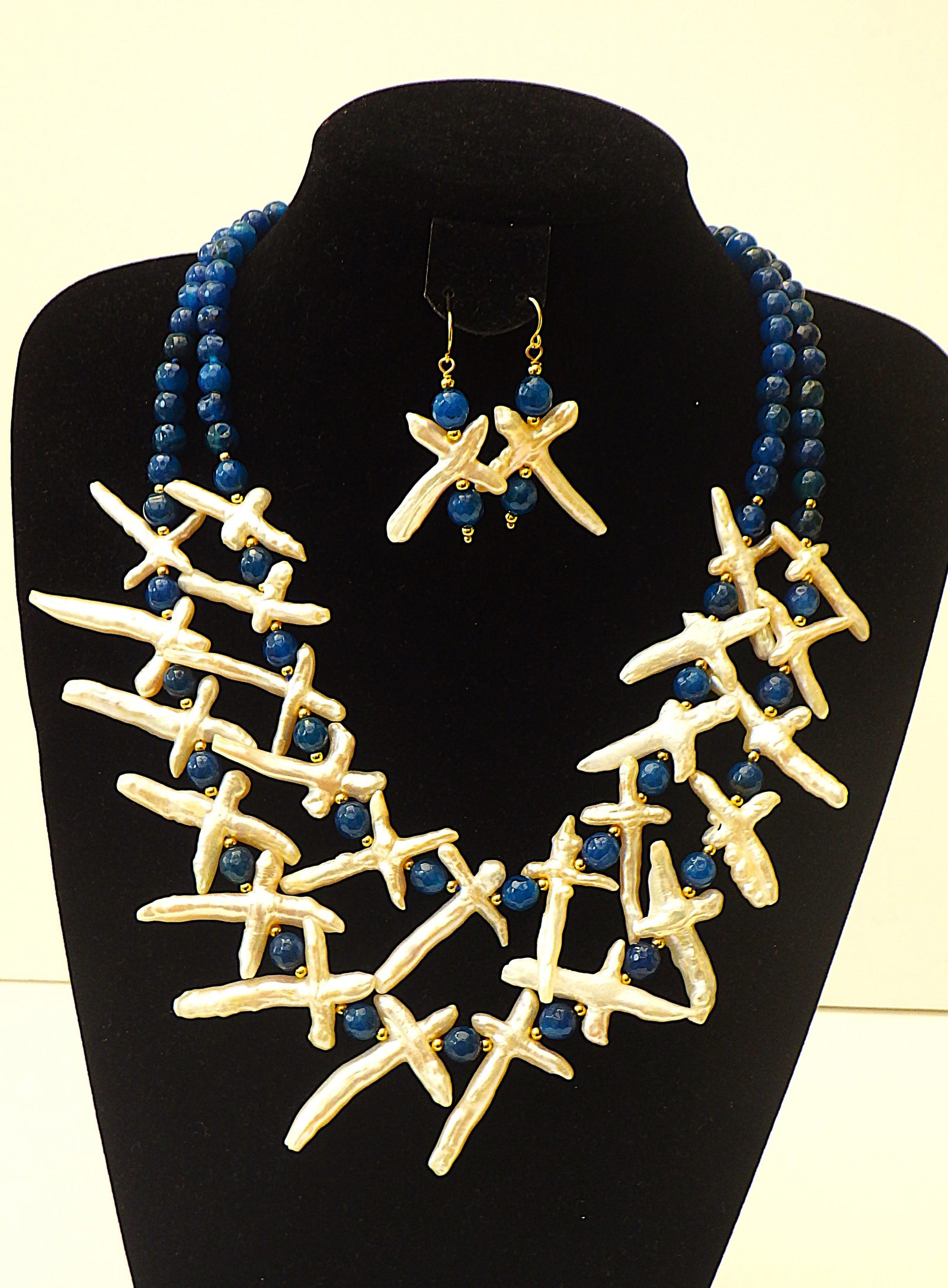 Two strand necklace & earrings set with natural cross shaped pearls & blue onyx.: Title: Two strand necklace & earrings set with natural cross shaped pearls & blue onyx. Description: A highly glamorous and very unusual two strand necklace and earrings set with very rare,