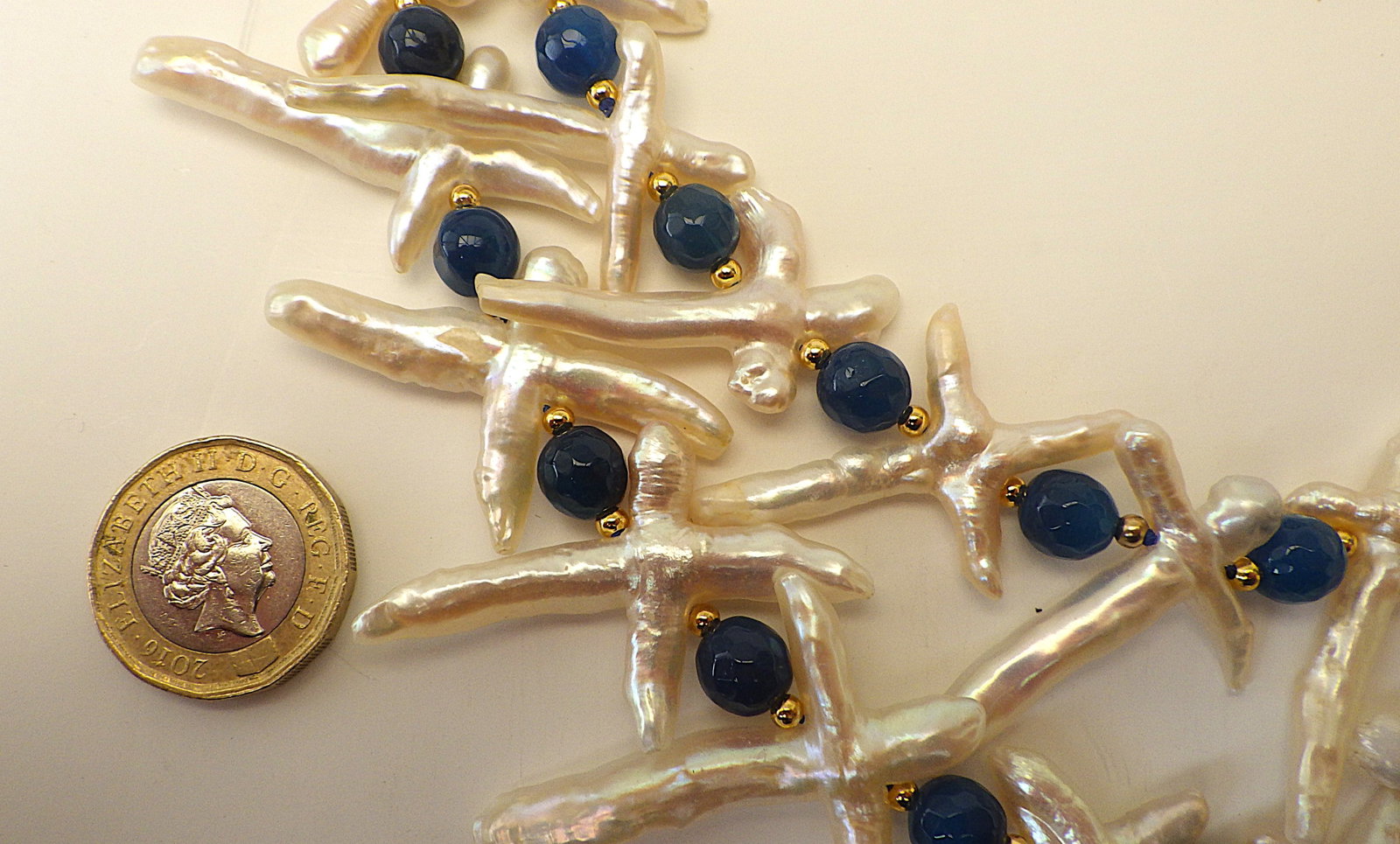 Two strand necklace & earrings set with natural cross shaped pearls & blue onyx. - 5