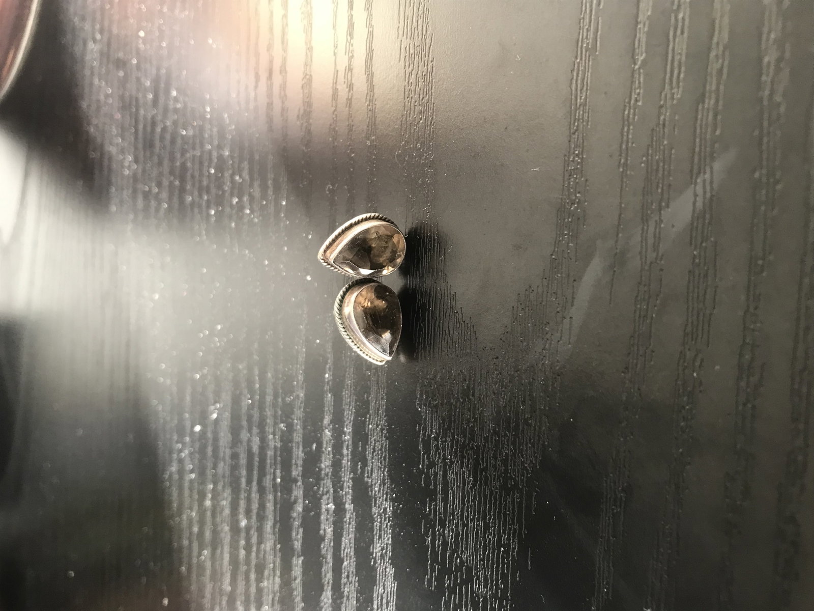 Smoky Quartz Sterling Silver Stud Earrings: Title: Smoky Quartz Sterling Silver Stud Earrings Description: Teardrop shape Smokey quartz stud earrings. 925 sterling silver. Very tiny nick on one of the quartz. Condition:
