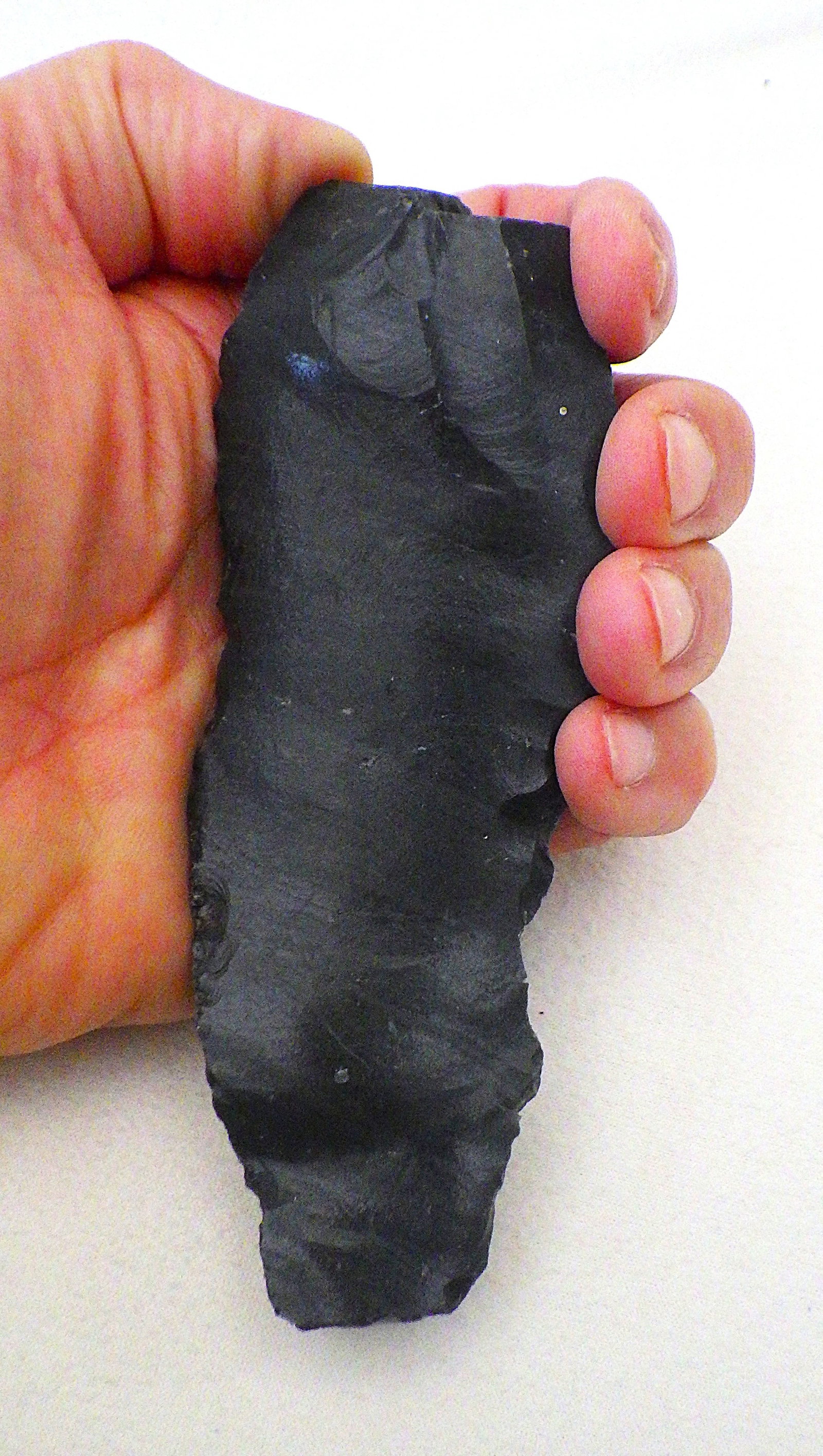 Large 13 cm Palaeolithic obsidian tool from Armenia 1.4 m.y.o.: Title: Large 13 cm Palaeolithic obsidian tool from Armenia 1.4 m.y.o. Description: A rare, uncharacteristically large, Palaeolithic obsidian tool, approximately 1.4 million years old from Mount