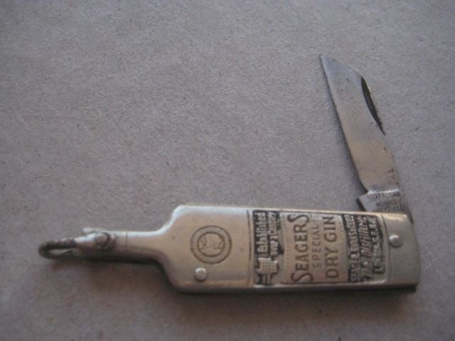 Vintage Seagers Special Dry Gin Advertising Penknife, c1940: Title: Vintage Seagers Special Dry Gin Advertising Penknife, c1940 Description: Vintage Seagers Special Dry Gin Advertising Penknife in the form of a bottle. Dates to around 1940.