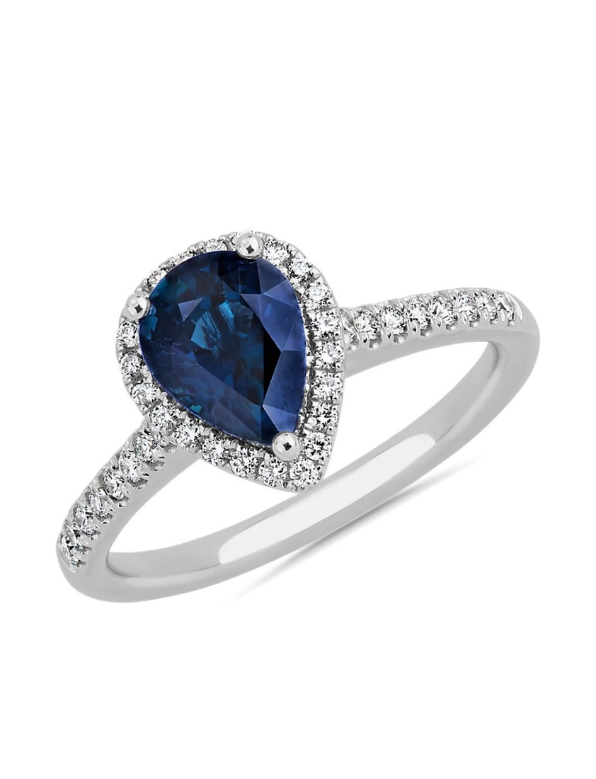 Platinum Sapphire and Diamond Ring: Title: Platinum Sapphire and Diamond Ring Description: Platinum ring with a natural pear cut approximately 1.6ct sapphire. Excellent clarity and colour saturation. Set with natural diamonds approx
