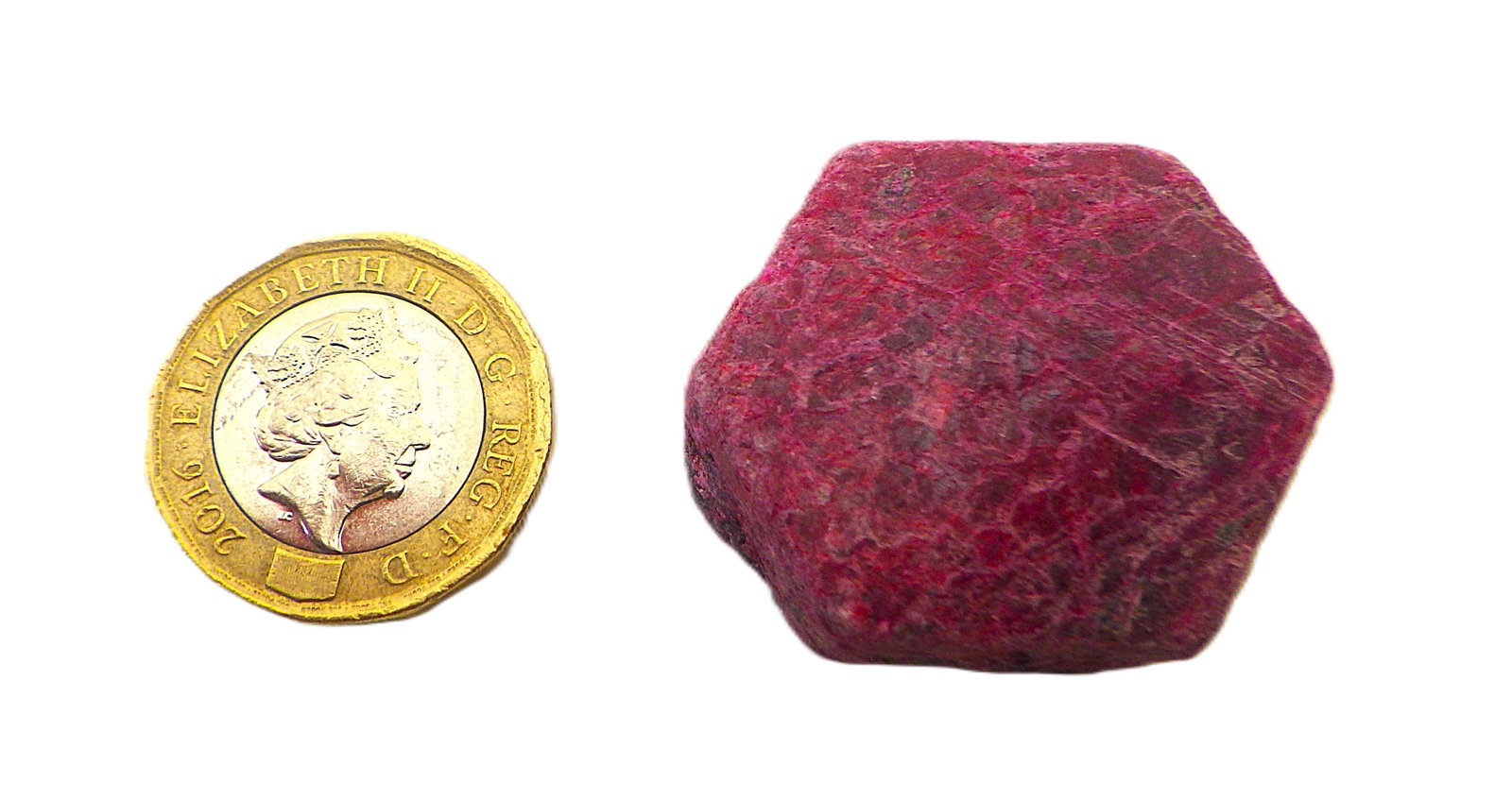 Large 152 carats natural hexagonal ruby crystal: Title: Large 152 carats natural hexagonal ruby crystal Description: A wonderful mineralogical specimen of a large (152 carats) natural Ruby crystal with small hornblende inclusions. Good colour