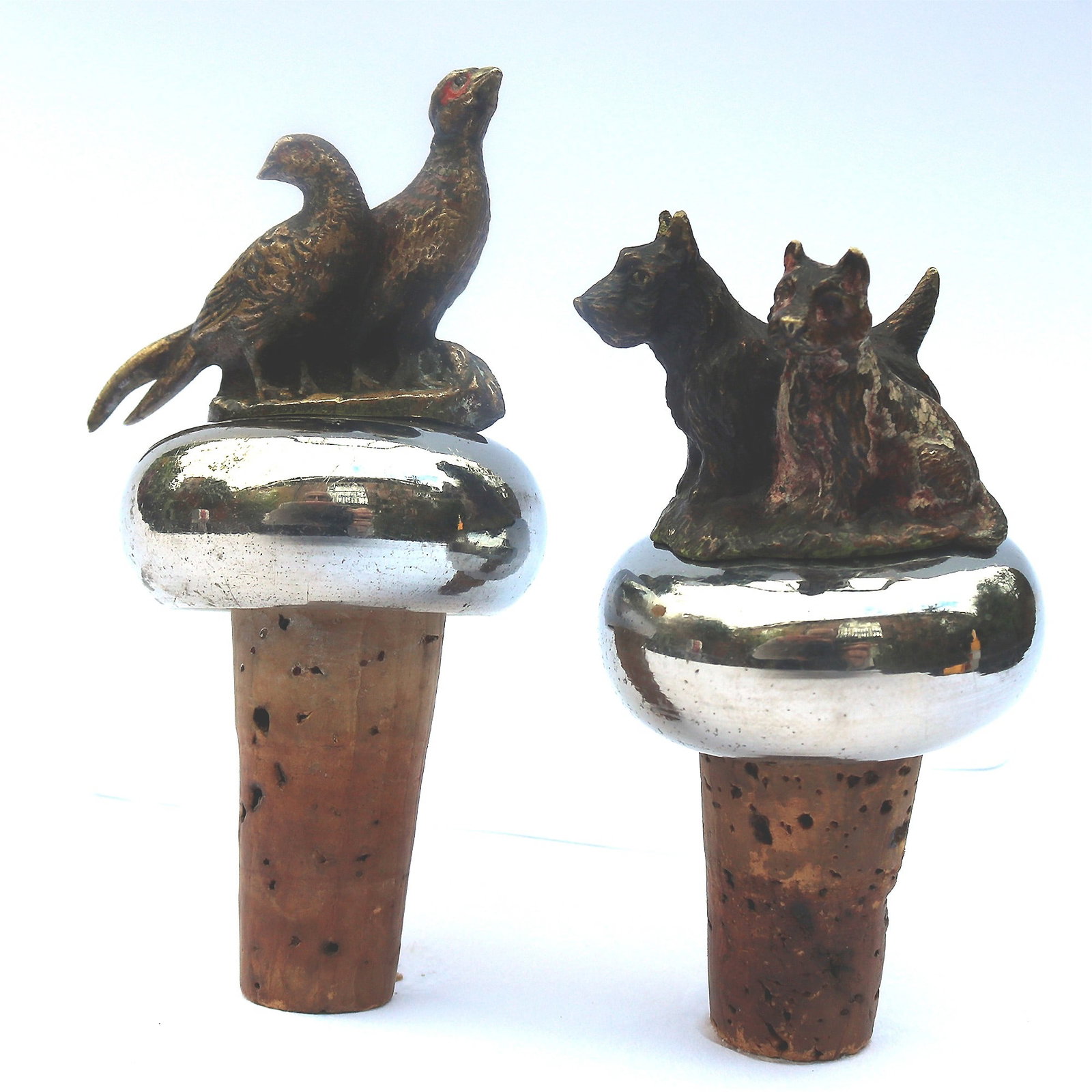 A pair of antique cold painted bronze novelty animal Bottle Stoppers C.1900 - 2
