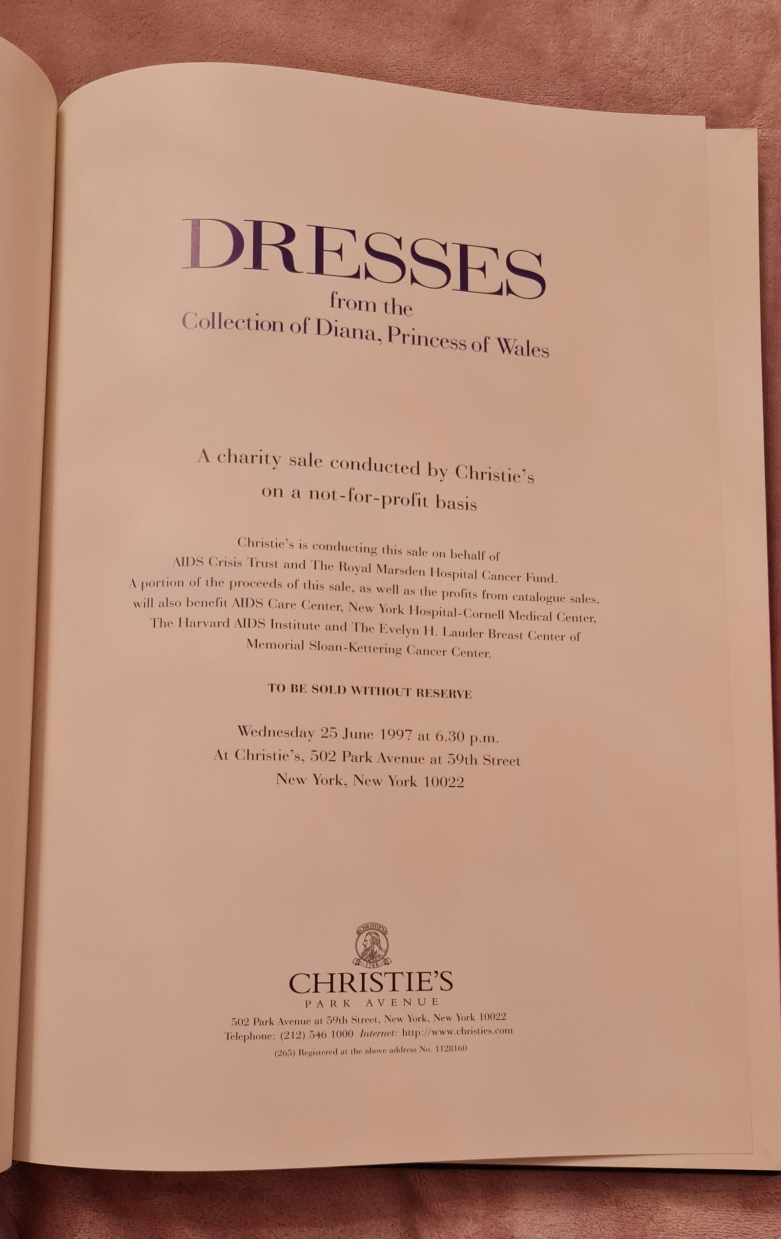 Christies Princess Diana's Leatherbound catalogue of dresses signed by Princess Diana.: Title: Christies Princess Diana's Leatherbound catalogue of dresses signed by Princess Diana. Description: One limited edition leatherbound catalogue of Princess Diana's dresses sold by Christies