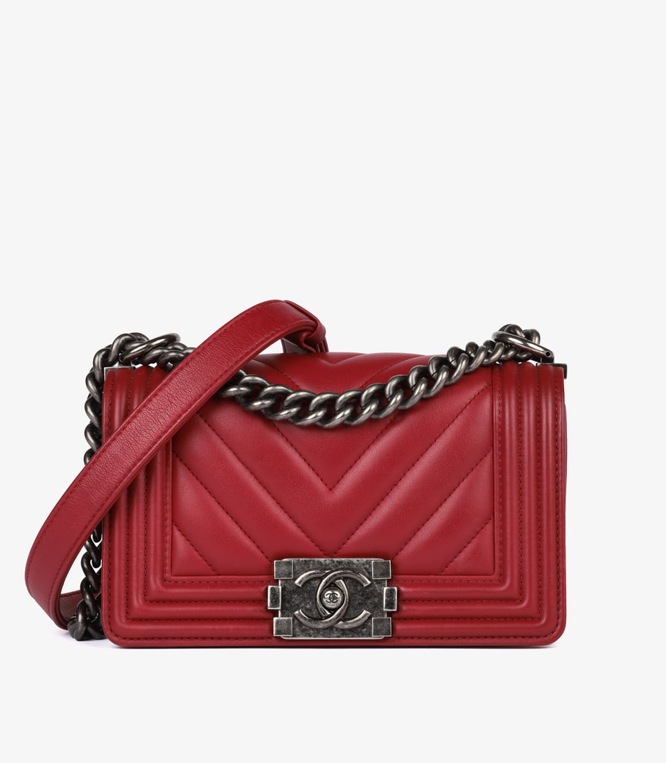Chanel Dark Red Chevron Quilted Lambskin Leather Small Le Boy Bag: Title: Chanel Dark Red Chevron Quilted Lambskin Leather Small Le Boy Bag Description: Chanel Dark Red Chevron Quilted Lambskin Leather Small Le Boy Product Details HB6019